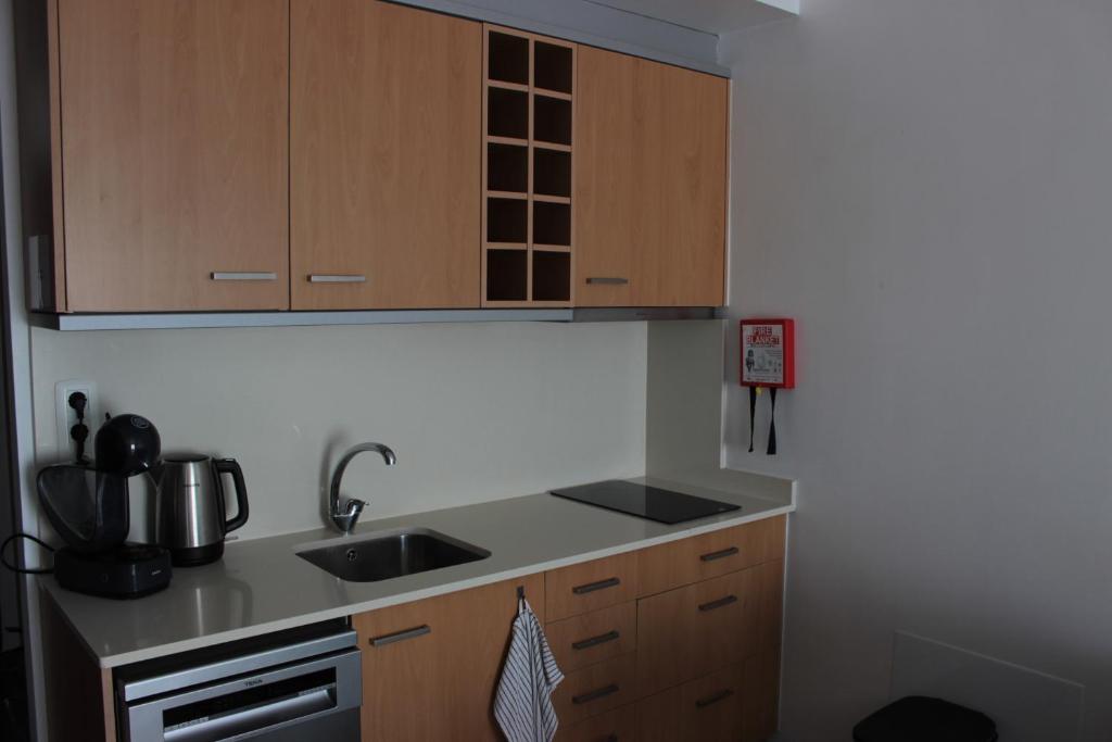 Kuchyň nebo kuchyňský kout v ubytování S215 Apartamento Las Dunas Oliva Nova