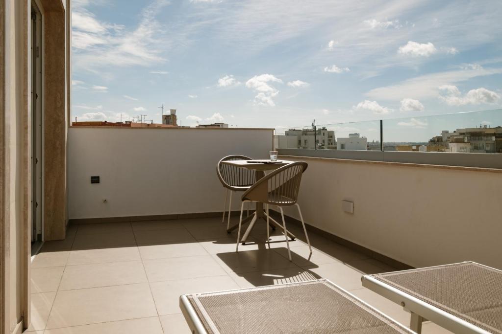 Balkón nebo terasa v ubytování The Sliema Suites