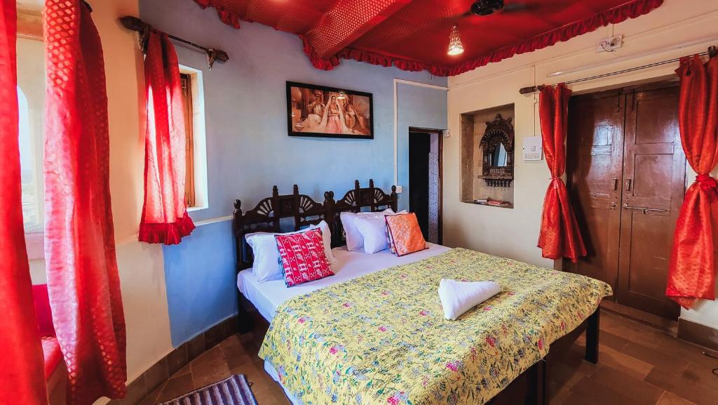 Ліжко або ліжка в номері Sagar Guest House