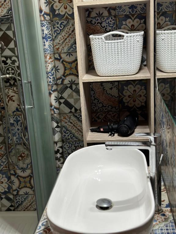 Koupelna v ubytování O munti rooms