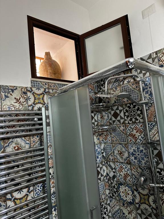 Koupelna v ubytování O munti rooms