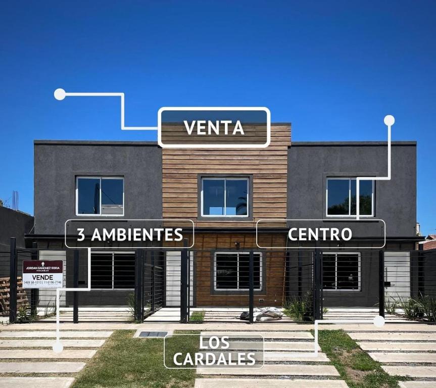 a building with street signs in front of it at Departamento Los Cardales in Los Cardales