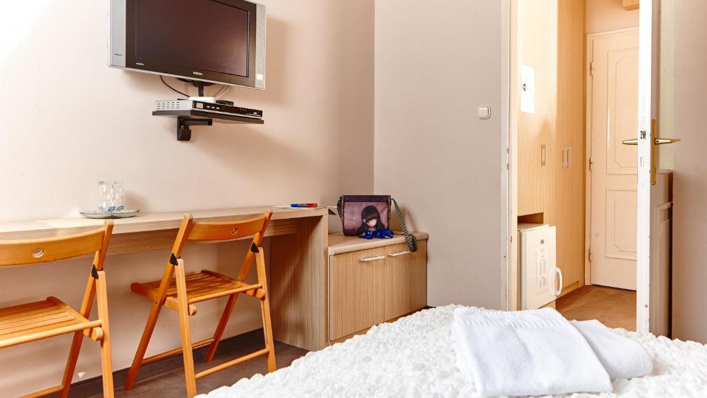 TV a/nebo společenská místnost v ubytování BI&BI