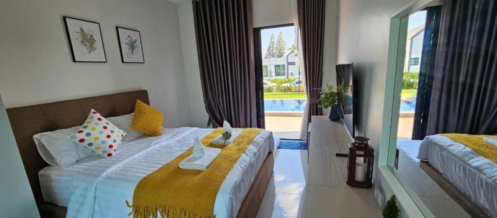 Ένα ή περισσότερα κρεβάτια σε δωμάτιο στο TRE Khaoyai Pool Villa ทรีเขาใหญ่ พูลวิลล่า