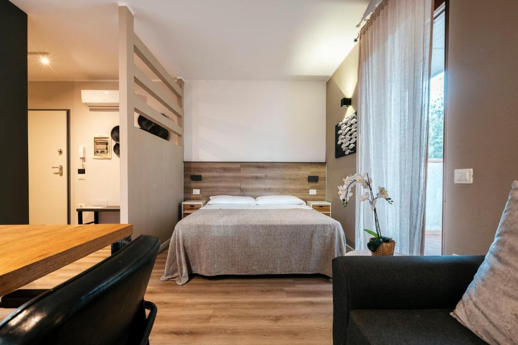 Кровать или кровати в номере Mistral Apartments