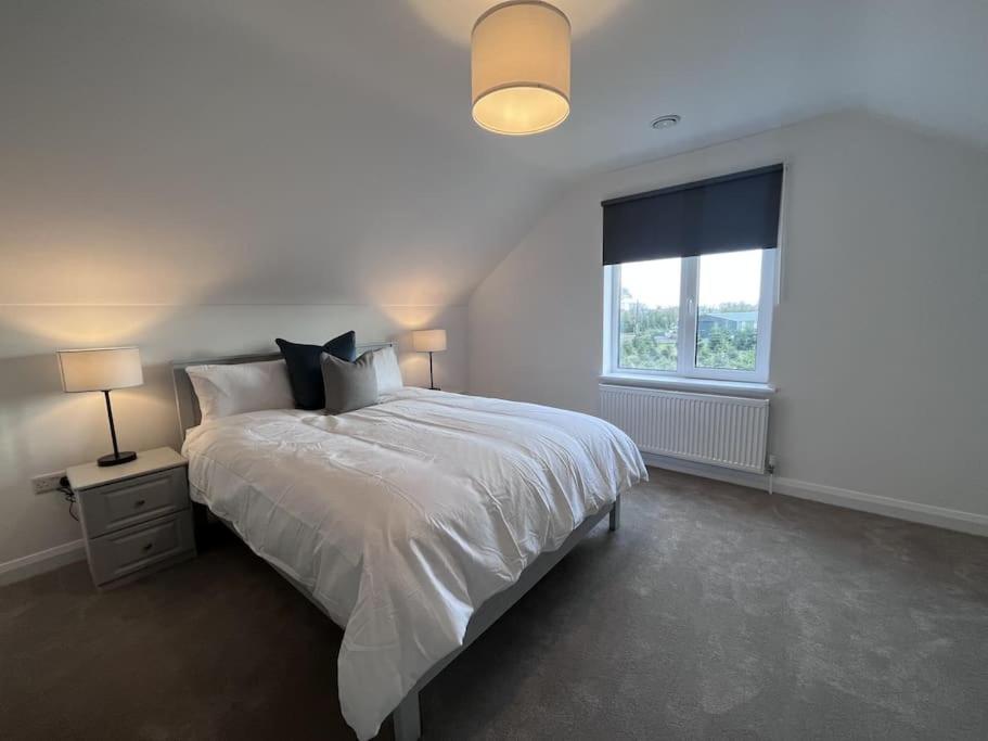 Voodi või voodid majutusasutuse Modern Dunboyne Home toas