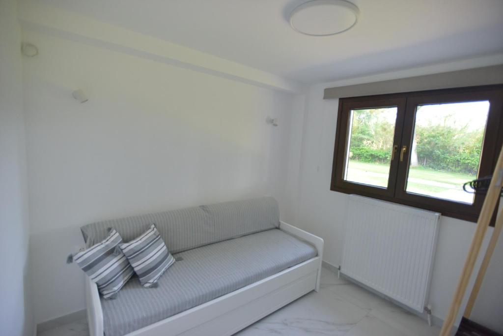 Posezení v ubytování Theros-Cottage