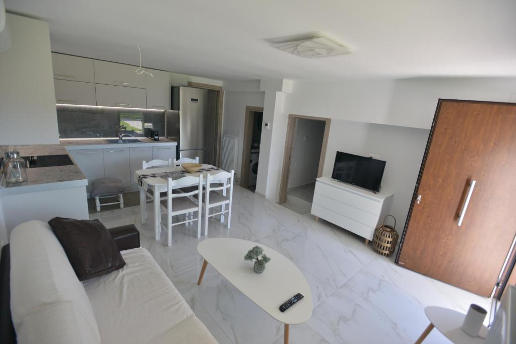 Kuchyň nebo kuchyňský kout v ubytování Theros-Cottage