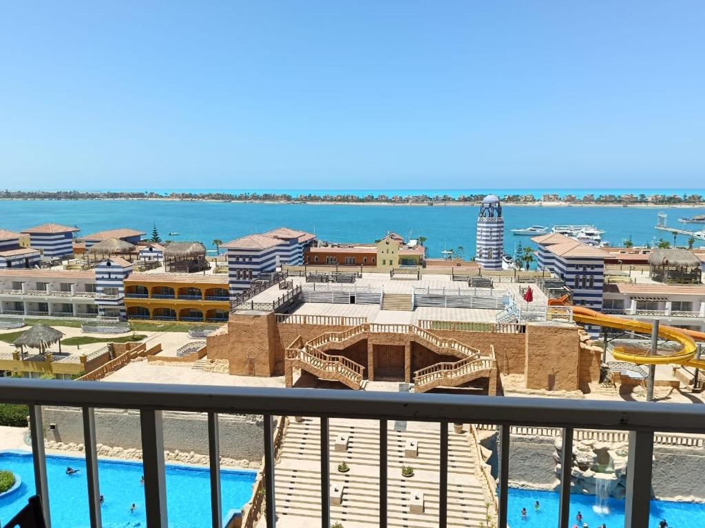 a view of a water park from a balcony at بورتو مارينا الساحل الشمالي in Abû Zeira