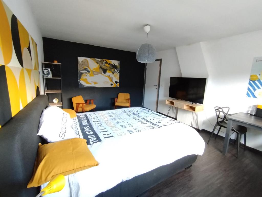 Postel nebo postele na pokoji v ubytování La Citronnade