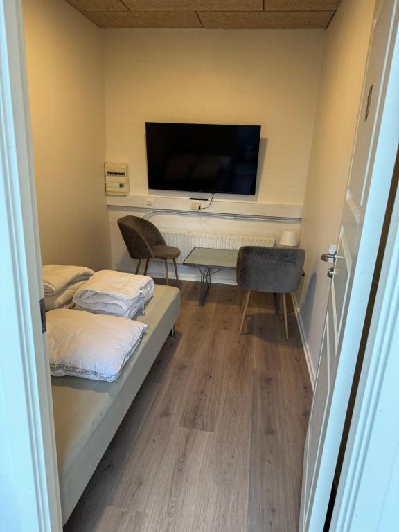 TV a/nebo společenská místnost v ubytování Italian Rooms 9