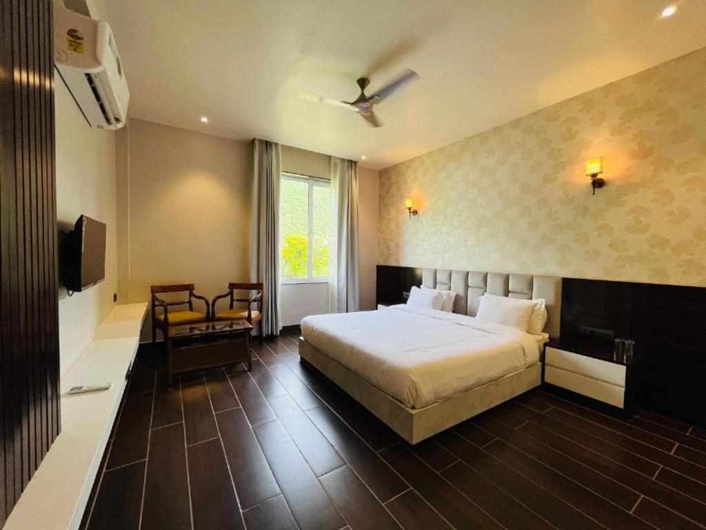 Katil atau katil-katil dalam bilik di Hotel 777, Pushkar By Shivaneel Hospitality