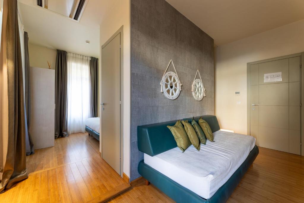 Postel nebo postele na pokoji v ubytování Hotel San Giorgio