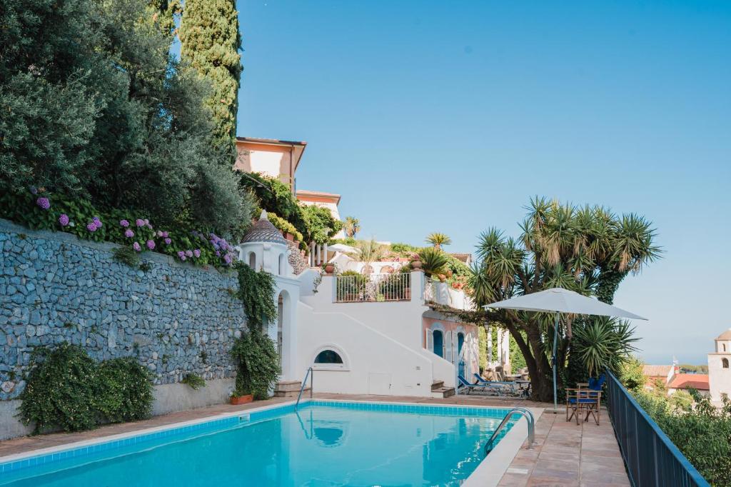 The swimming pool at or close to Villa la Campanella by Elite Villas
