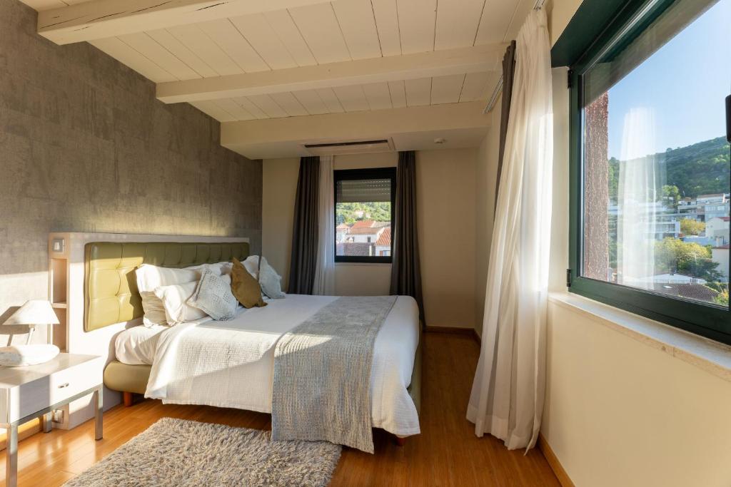 Postel nebo postele na pokoji v ubytování Hotel San Giorgio