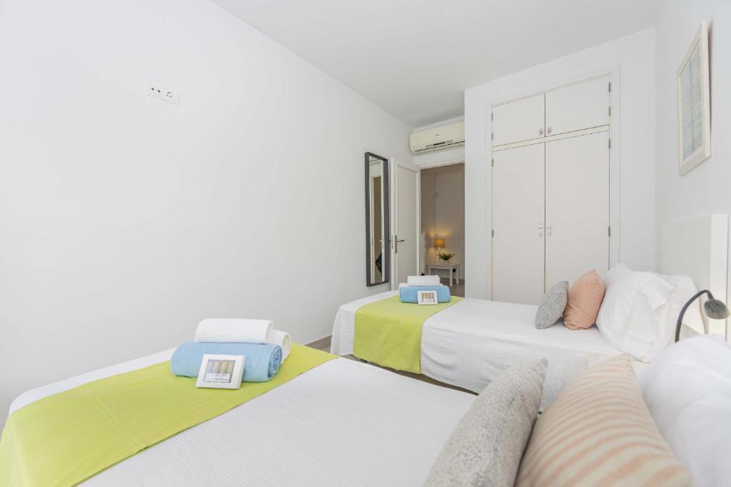 A bed or beds in a room at Laia House / Laia's house