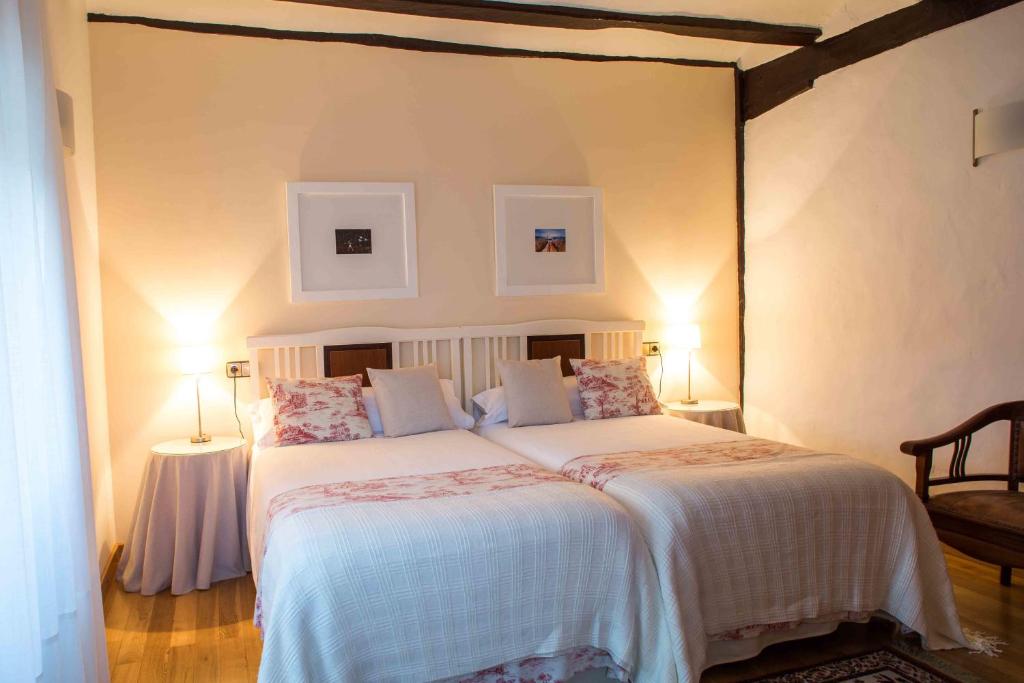 Postel nebo postele na pokoji v ubytování Casa de la Cadena