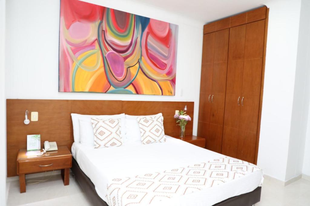Postel nebo postele na pokoji v ubytování Hotel Guane