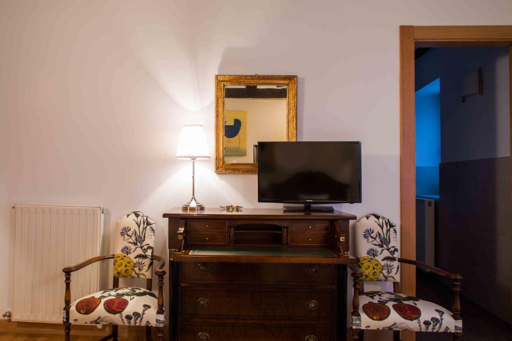 TV a/nebo společenská místnost v ubytování Casa de la Cadena