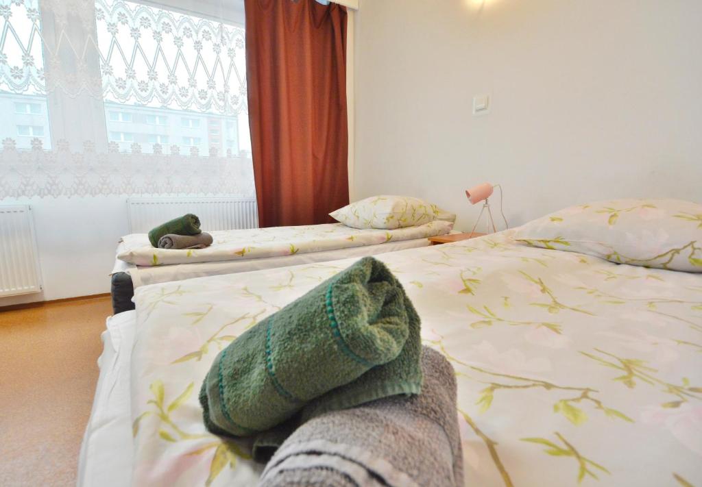 Posteľ alebo postele v izbe v ubytovaní Twój Hostel Bytom