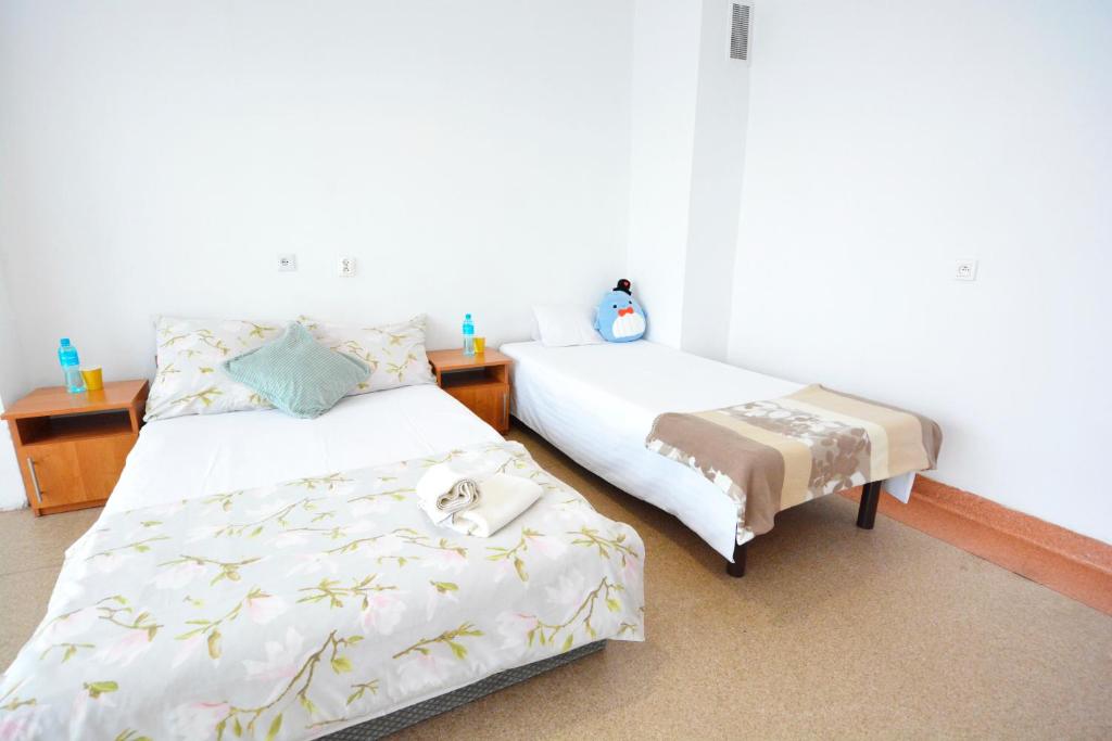 Posteľ alebo postele v izbe v ubytovaní Twój Hostel Bytom