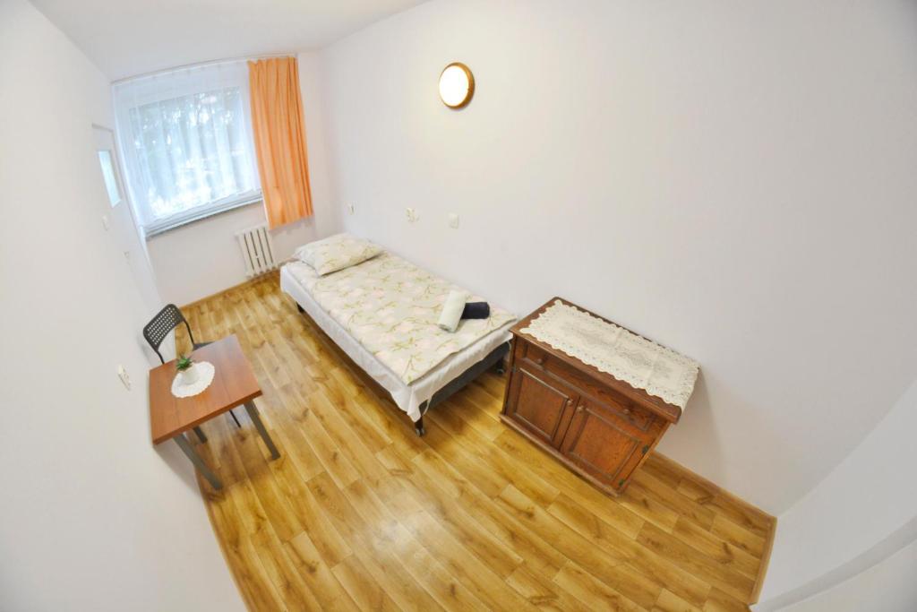 Posteľ alebo postele v izbe v ubytovaní Twój Hostel Bytom
