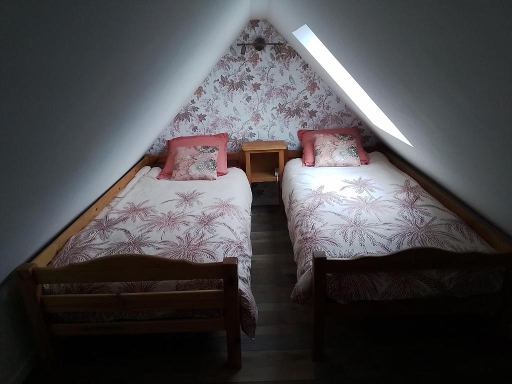 Postel nebo postele na pokoji v ubytování Le huit Gite dans villa Aultoise