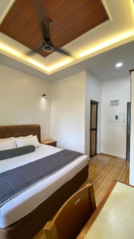 Postel nebo postele na pokoji v ubytování Eleven25 Roomstay