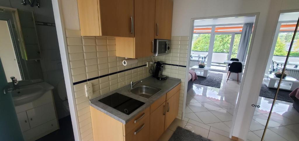 Kuchyň nebo kuchyňský kout v ubytování Ferienwohnung Charlie mit Seeblick