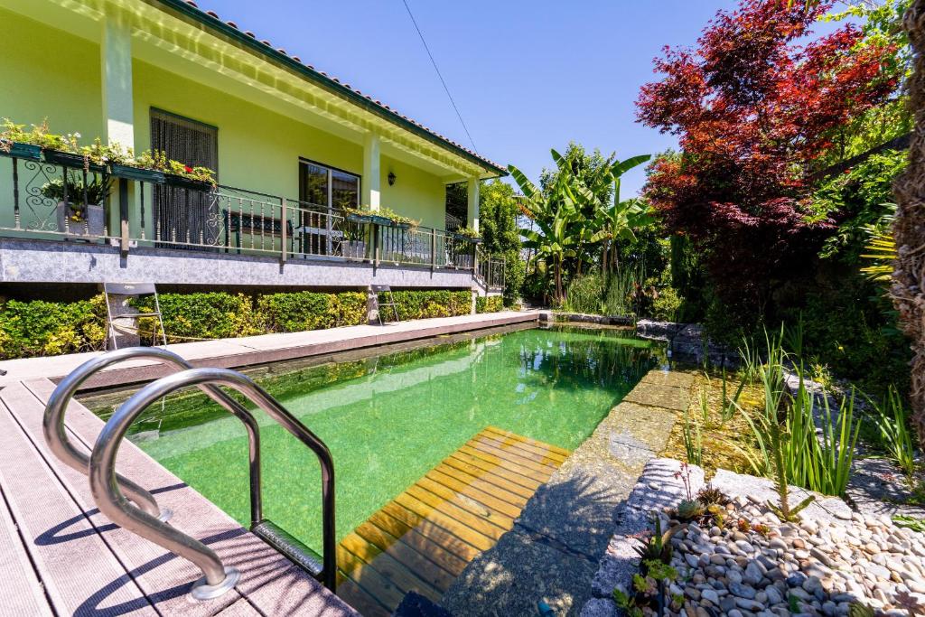 Πισίνα στο ή κοντά στο Gondomar Guimarães - Moradia V3 com piscina natural by House and People