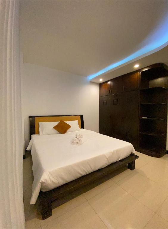 Postel nebo postele na pokoji v ubytování SOCHU HOUSE- Tuần Châu Homestay & Coffee