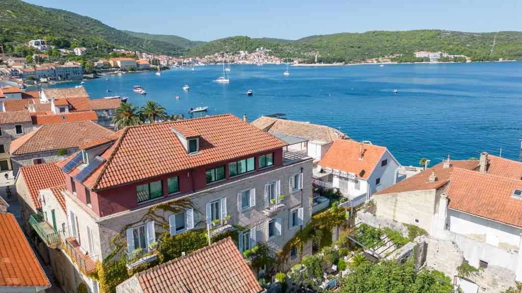 a view of the town of dubrovnik overlooking the water at Hotel San Giorgio in Vis
