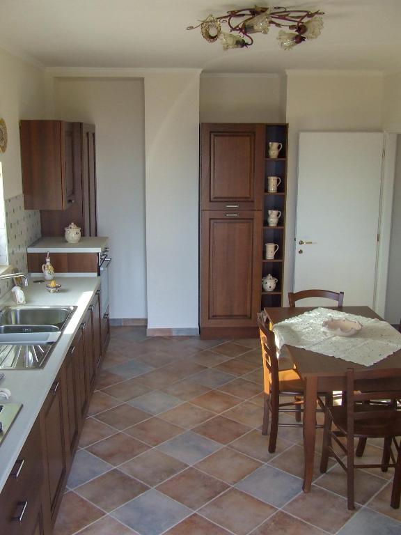 Kuchyň nebo kuchyňský kout v ubytování Casa delle Campane