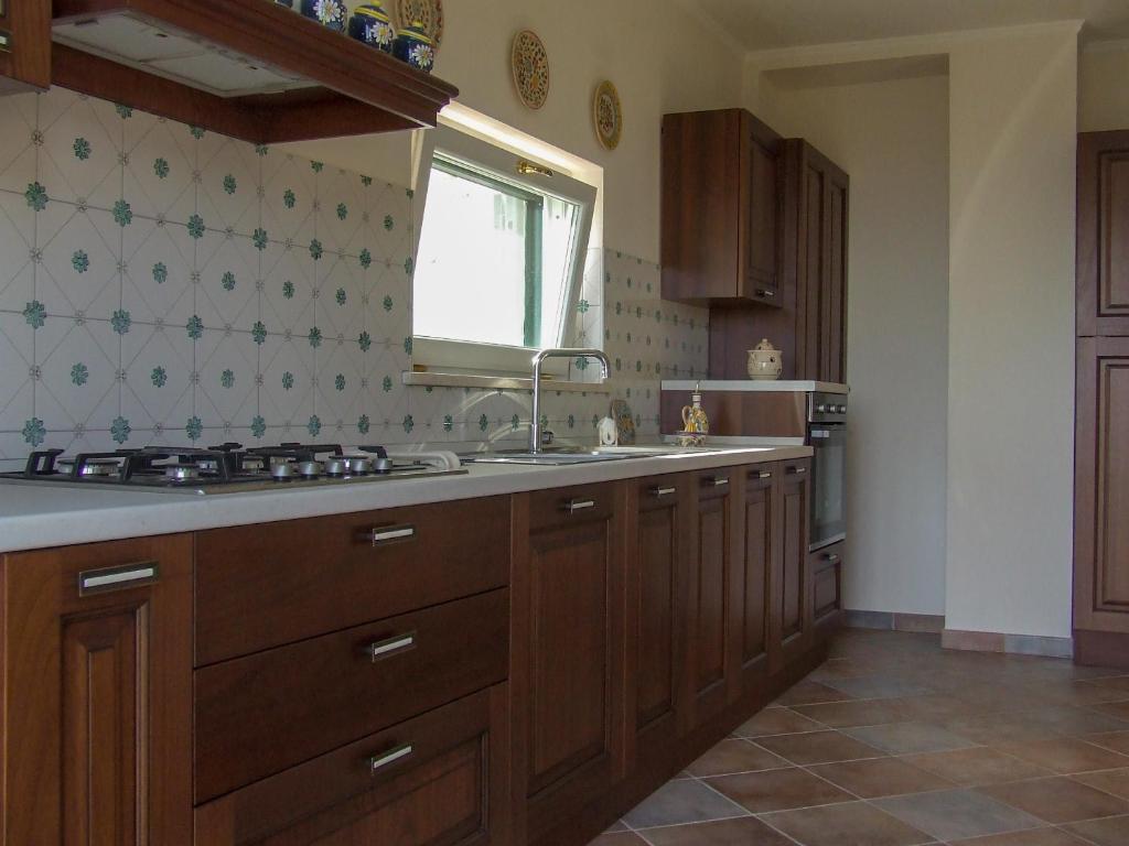 Kuchyň nebo kuchyňský kout v ubytování Casa delle Campane