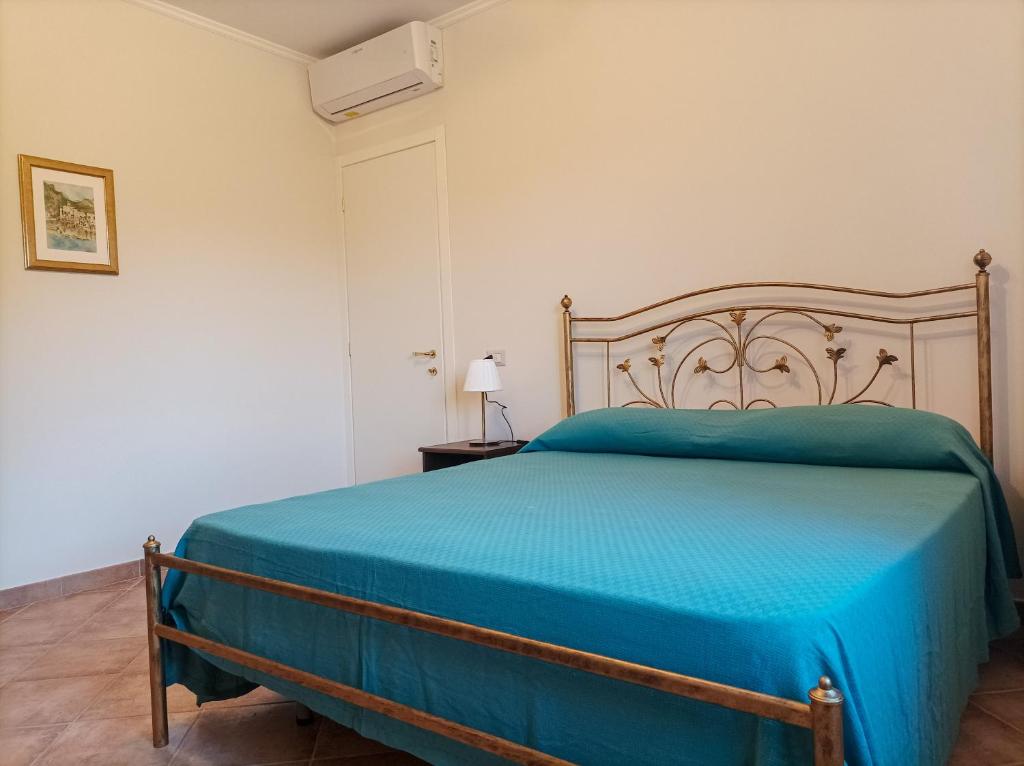 Postel nebo postele na pokoji v ubytování Casa delle Campane