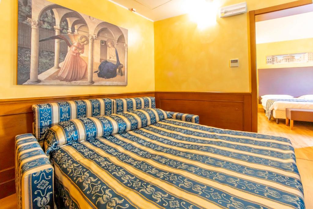 Postel nebo postele na pokoji v ubytování Hotel Riz B.B