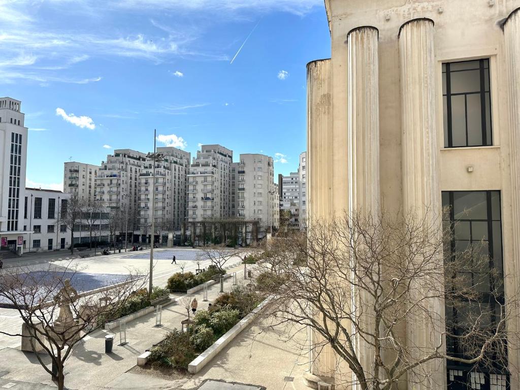 a view of a city with tall buildings at Au cœur des grattes ciels in Villeurbanne