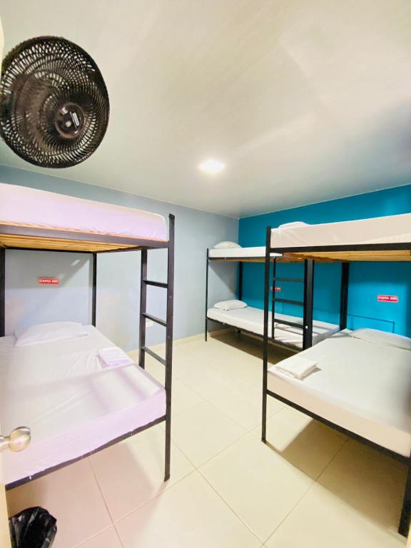 Postel nebo postele na pokoji v ubytování Havana Hostel Cali & Dance School