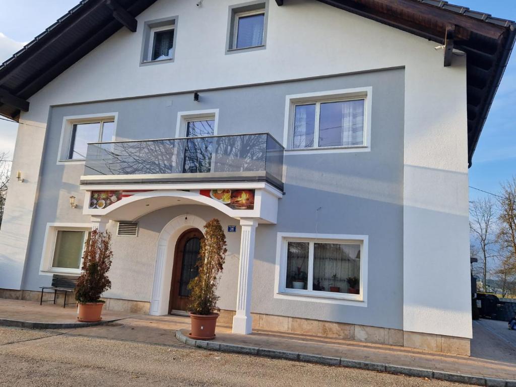 a white house with a glass roof at Appartment in Oberndorf bei Schwanenstadt in Schwanenstadt