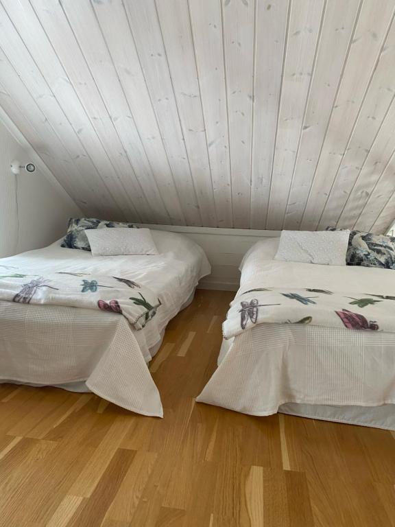 Postel nebo postele na pokoji v ubytování Lövlingskulle