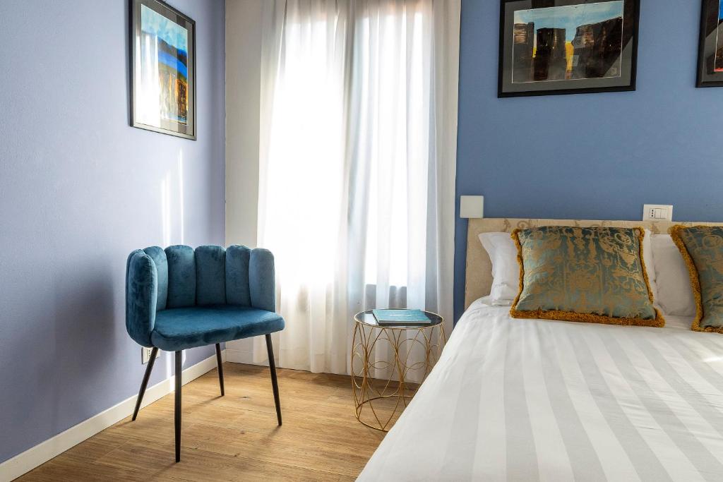 Posteľ alebo postele v izbe v ubytovaní Ca' dell'Arciere Apartments
