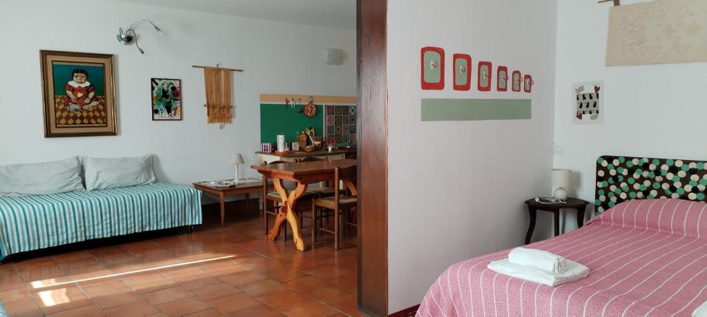 Postel nebo postele na pokoji v ubytování Stasion Di Pueste