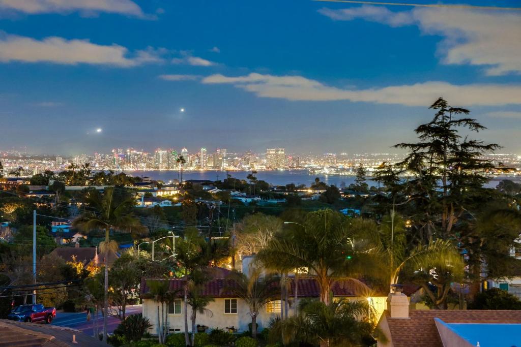 a view of the city at night at Point Loma Serenity in San Diego