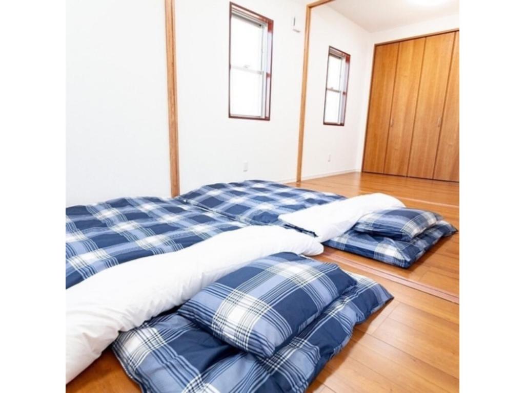 Säng eller sängar i ett rum på Guest House Ocean - Vacation STAY 07770v