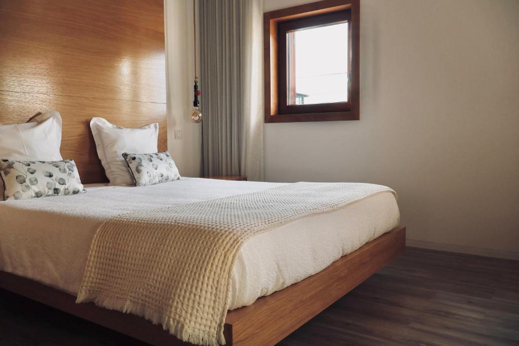 Postel nebo postele na pokoji v ubytování Casa Das Chães
