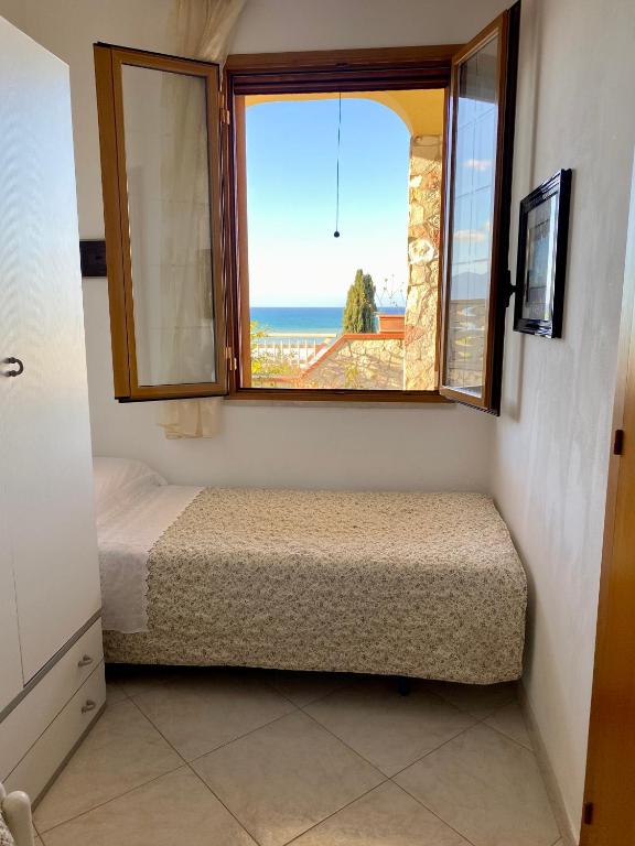 Posteľ alebo postele v izbe v ubytovaní Villa Mare Giuggiola