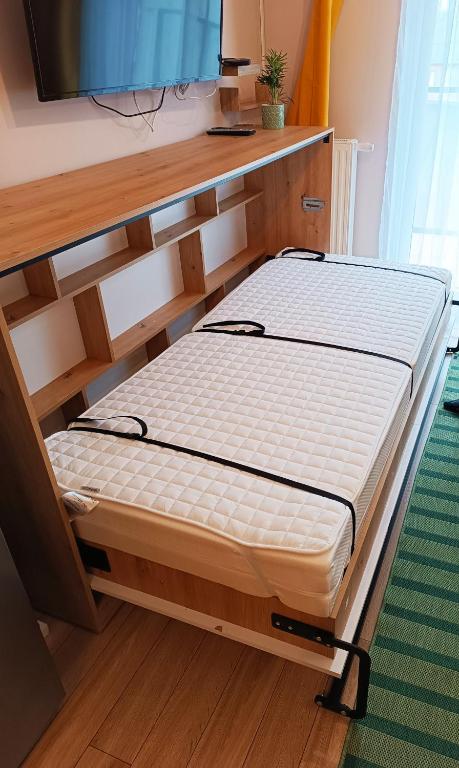 Posteľ alebo postele v izbe v ubytovaní Sleep In Apartament Centrum