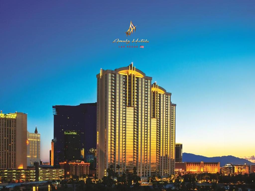 a city skyline with a large tall building at Amalz 2 Bedroom 3 Bathroom Balcony Suites at Mgm Signature ! in Las Vegas