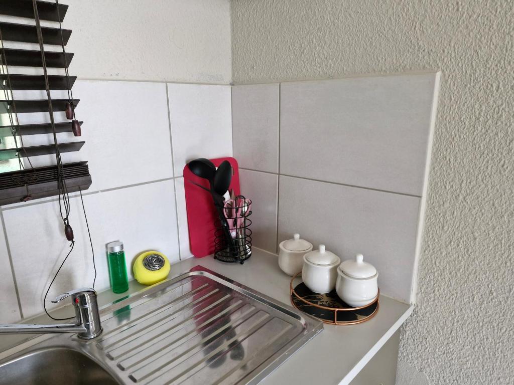 Kuchyň nebo kuchyňský kout v ubytování Botle Hive