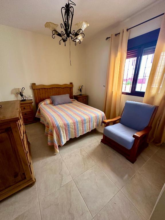 Postel nebo postele na pokoji v ubytování VillaCarreta piscina comunitaria y parking privado a 7 minutos de la playa a pie